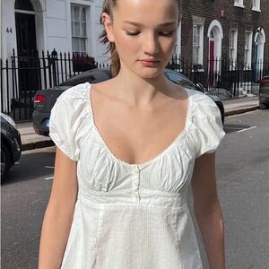 Brandy Melville Blair Ruffle Babydoll Top in Ivory One Size